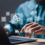 businessman-use-laptop-with-operations-management-technology-related-business-processes-workflows-high-performance-monitoring-evaluation-automation-concept