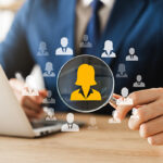 hrm-human-resource-management-concept-executive-holding-magnifying-glass-search-effective-personnel-human-resource-management-organization-human-development-recruitment